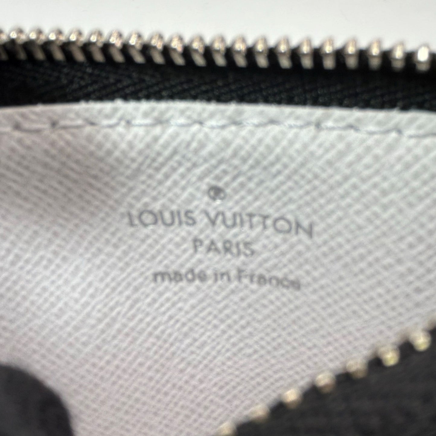 Louis Vuitton_M30935 タイガラマ モノグラム_ガストン・ウェアラブルウォレット _36825