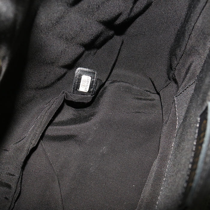 CHANEL Matelassé Lambskin Mini Backpack - Black