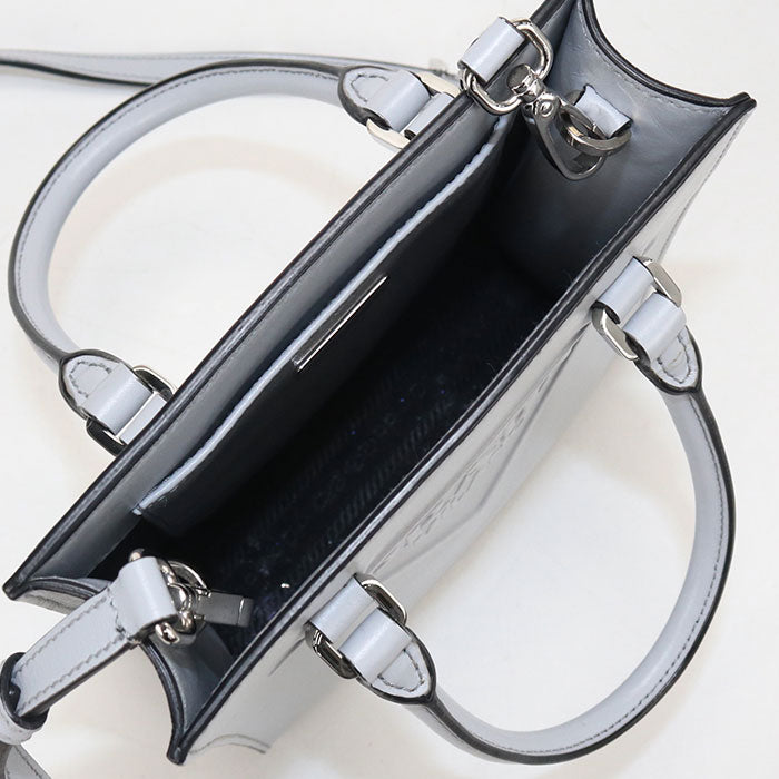 PRADA エンボス トライアングルロゴ カーフスキン ハンドバッグ ショルダーバッグ - ブルー